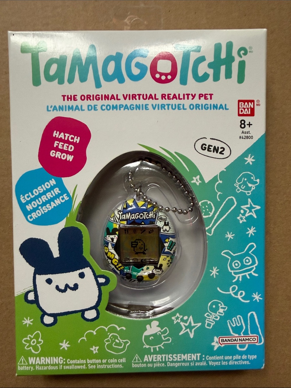 Tamagotchi Virtual Pet - Teal & White Egg Pattern. Collectible.